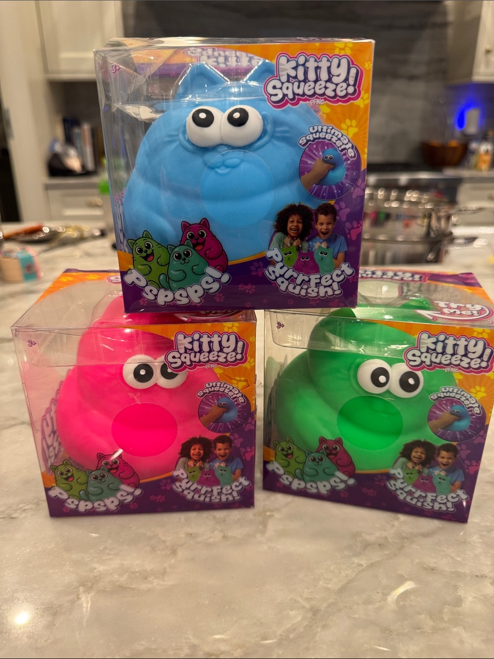 Squeeze Kitty Squeeze! Plush Squish Toy - Blue, Pink, Green
